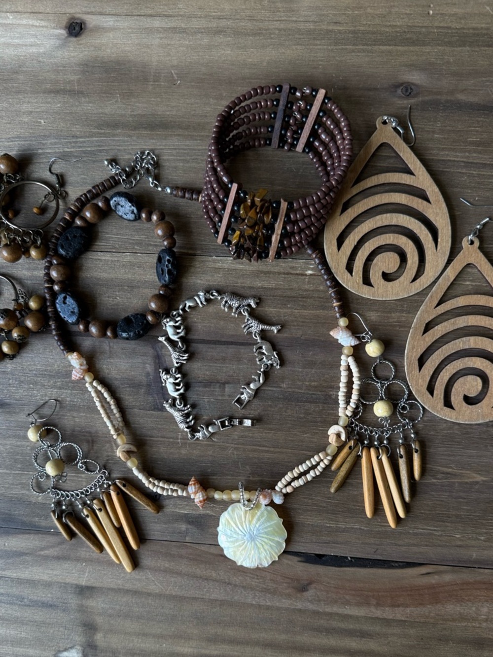 Beautiful boho-inspired jewelry bundle in warm earthy tones 🤎